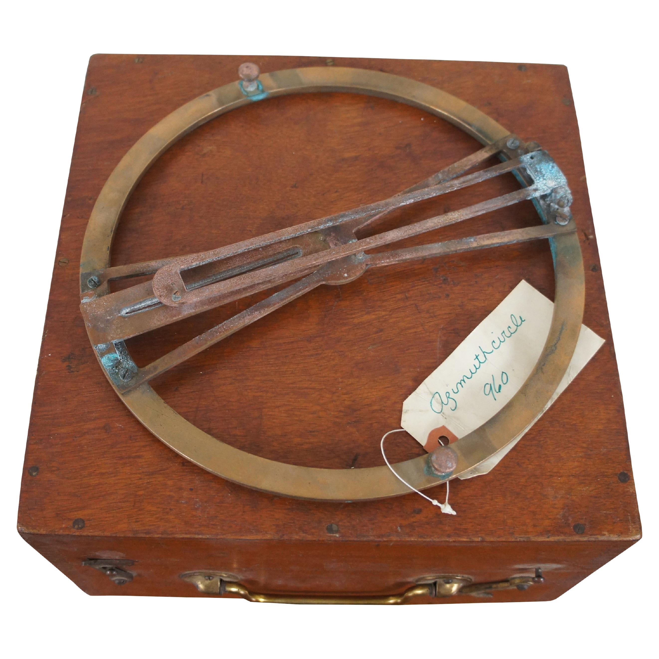 WWII Era Thomson System Azimuth Instrument and wooden storage / carrying case.

An azimuth circle is a navigation instrument in the form of a brass ring with sights that attaches to the top of a compass to enable the user to take accurate bearings