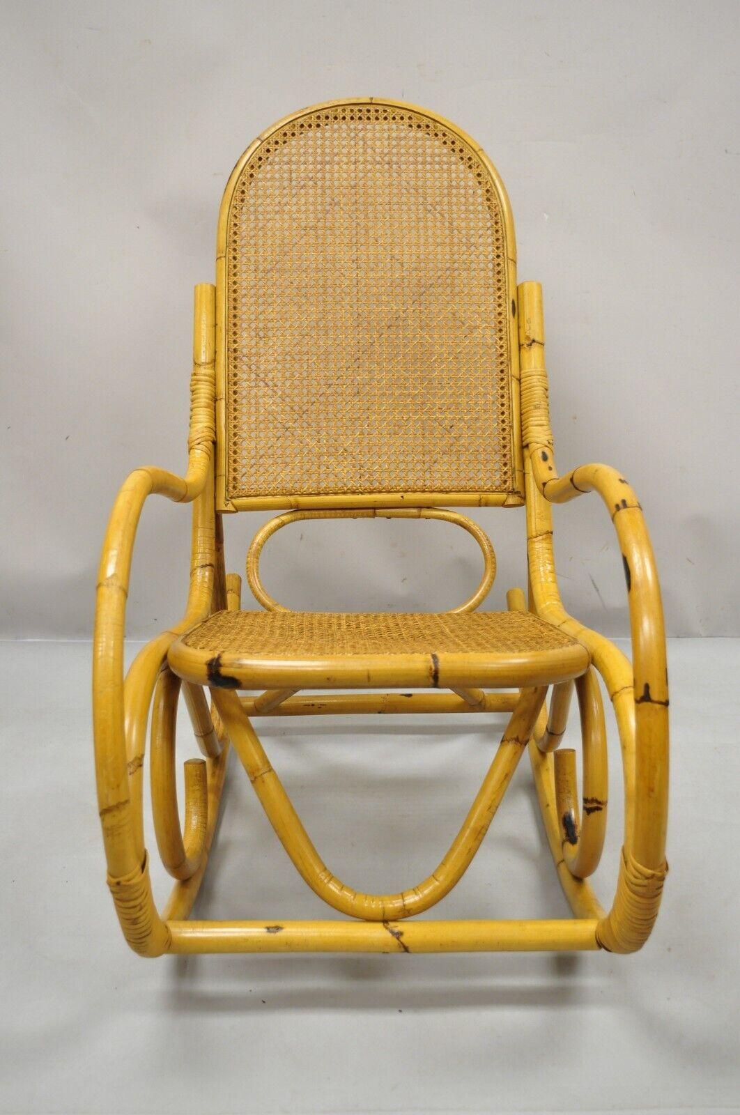 Vintage Thonet Bentwood and Rattan Cane Rocker rocking chair by Cerda. Item features rattan wrapped bentwood frame, cane back and seat, distressed finish, original label, very nice vintage item, great style and form. Circa Mid 20th Century.