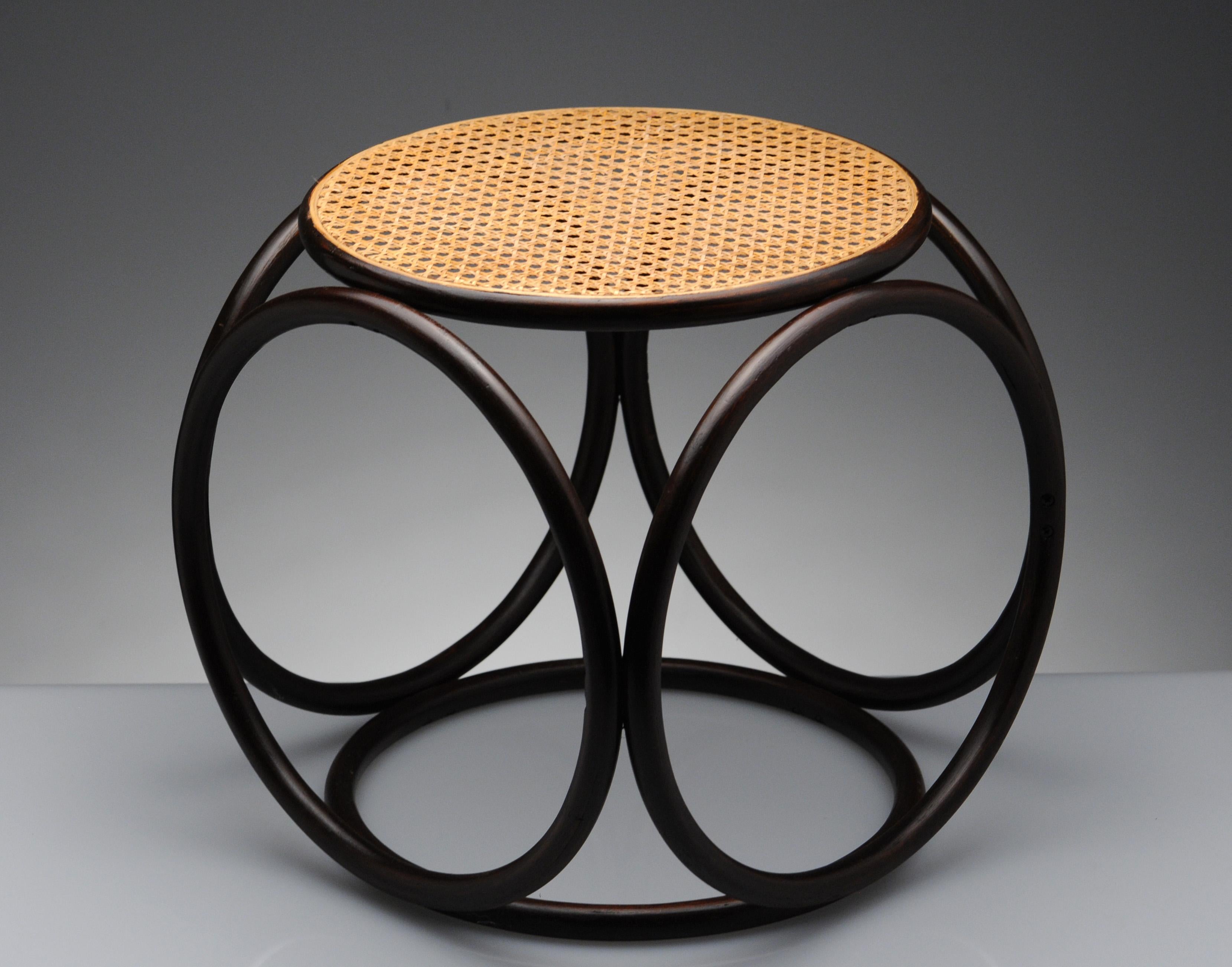 Appealing circular designed stool by Thonet. Sculptural and versatile design, can be used as a side table or ottoman as well.