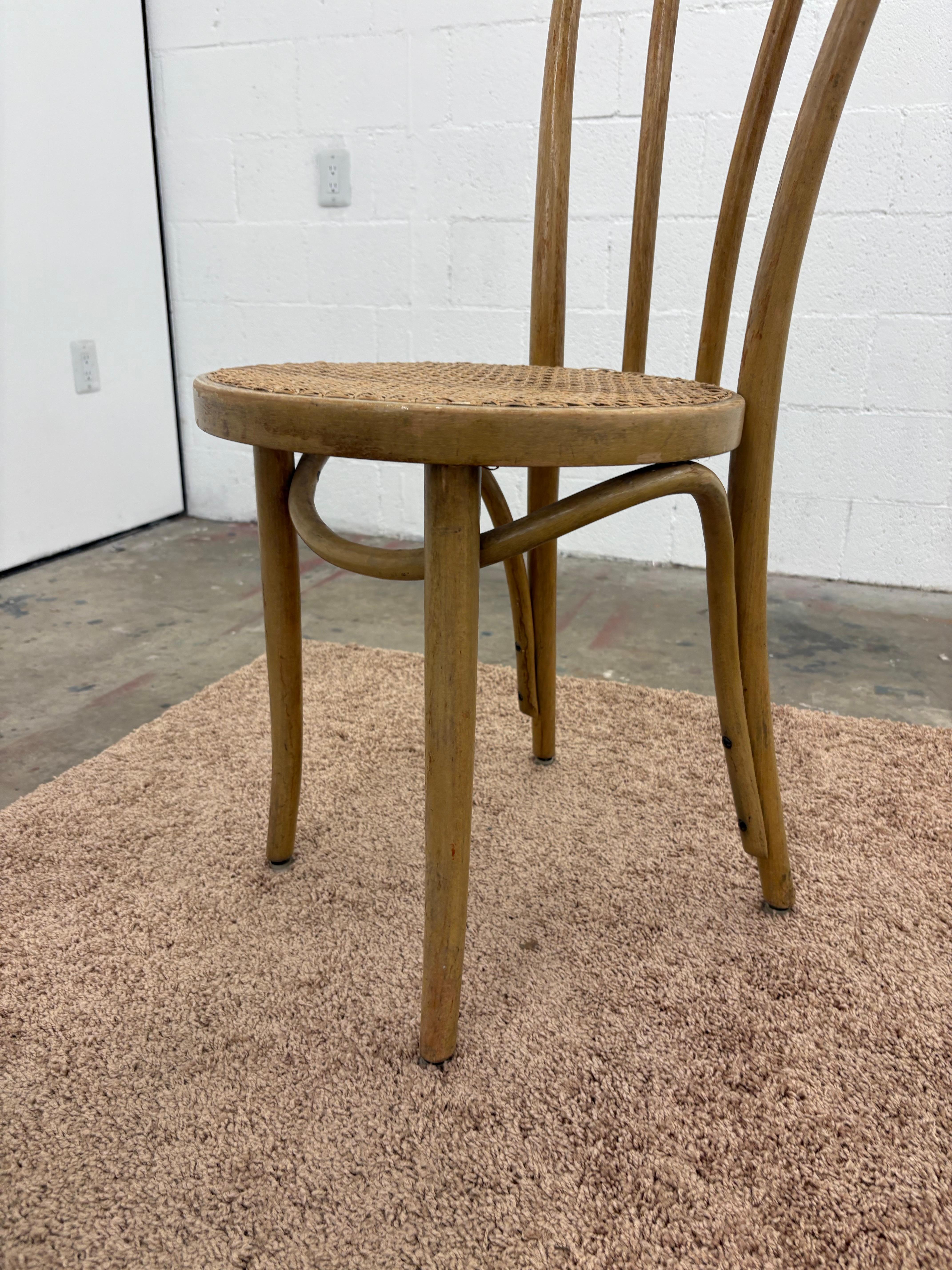 Vintage No. 18 Classic bistro Cafe Ice Cream Parlor chair. 
 Structurally sound with original cane in very good condition. 

Attributed to Thonet.
Stamped “made in Poland” Thonet had a factory in Poland.
Some parts of a paper label remain, and