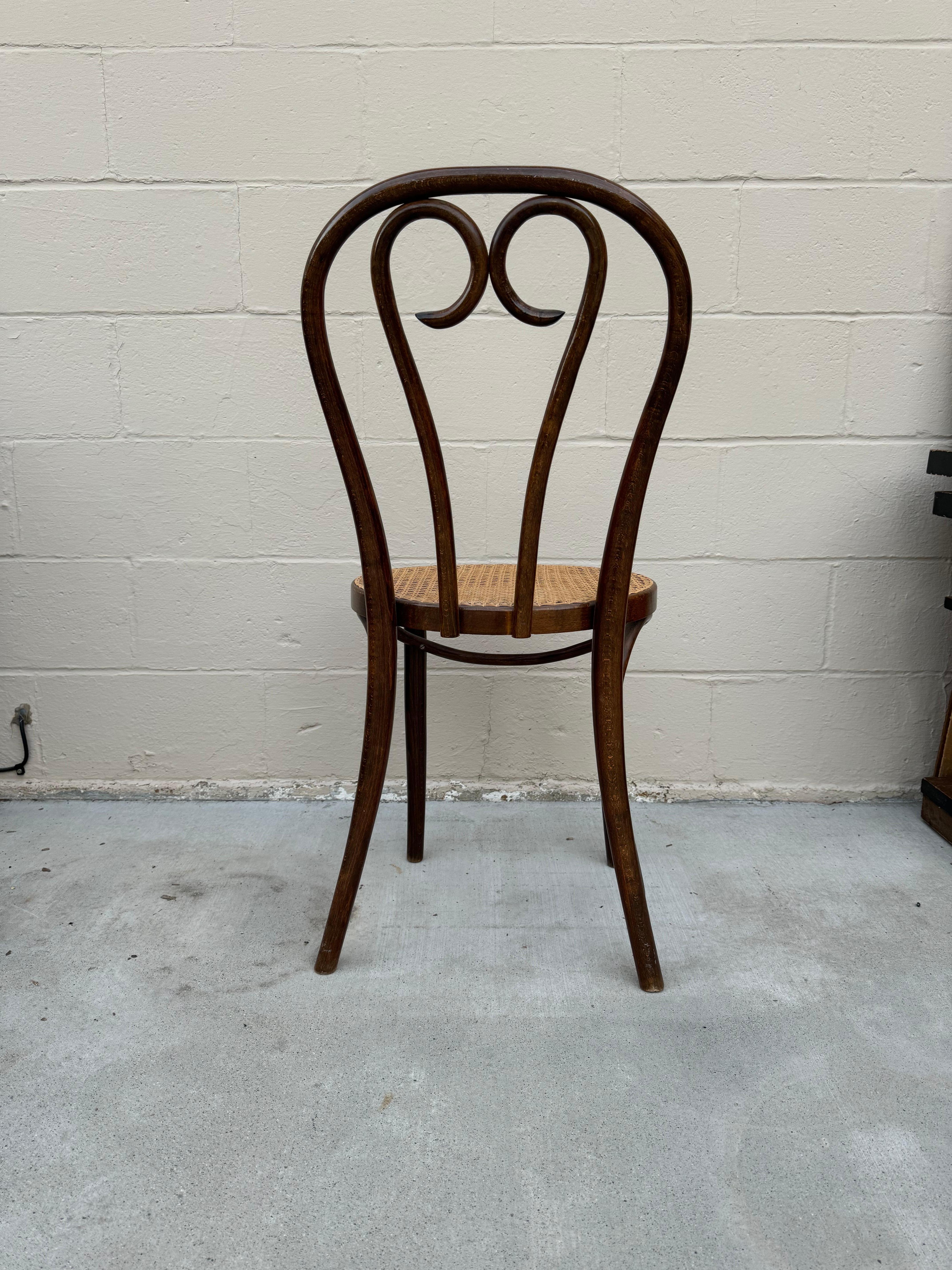 Hand-Crafted Vintage Thonet Style Bentwood Chair With Cane Seating For Sale