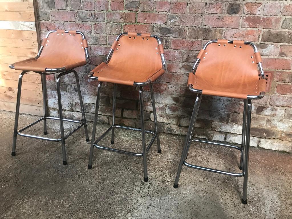 Sought after leather selected by Charlotte Perriand stools for Les Arcs, 1960.

Three Charlotte Perriand stools in France, stunning stools very unusual and sought after, selected by Charlotte Perriand for and used in the Ski Resort Les Arcs, circa
