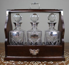 Vintage Three Bottle Cut Crystal Tantalus with Silver Plated Mounts