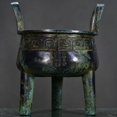 Vintage Three-Legged Chinese Ritual Censer with Carved Inscription Key Pattern