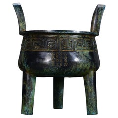 Vintage Three-Legged Chinese Ritual Censer with Carved Inscription Key Pattern