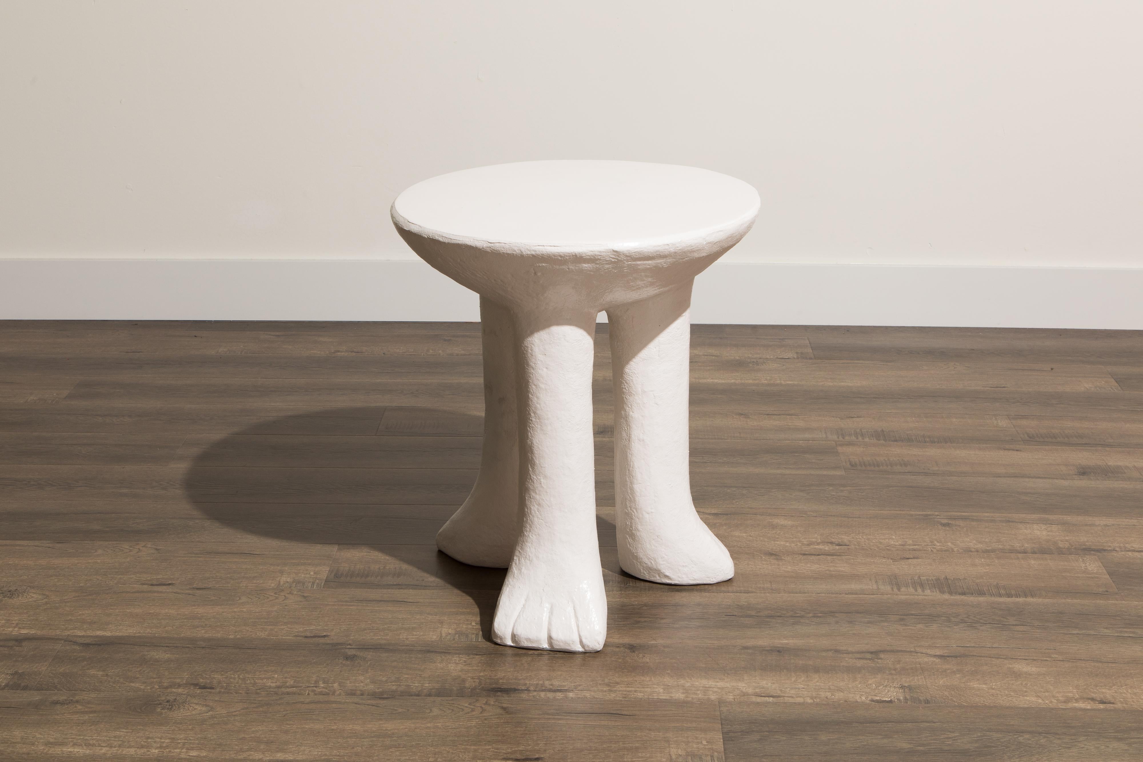 white plaster side table