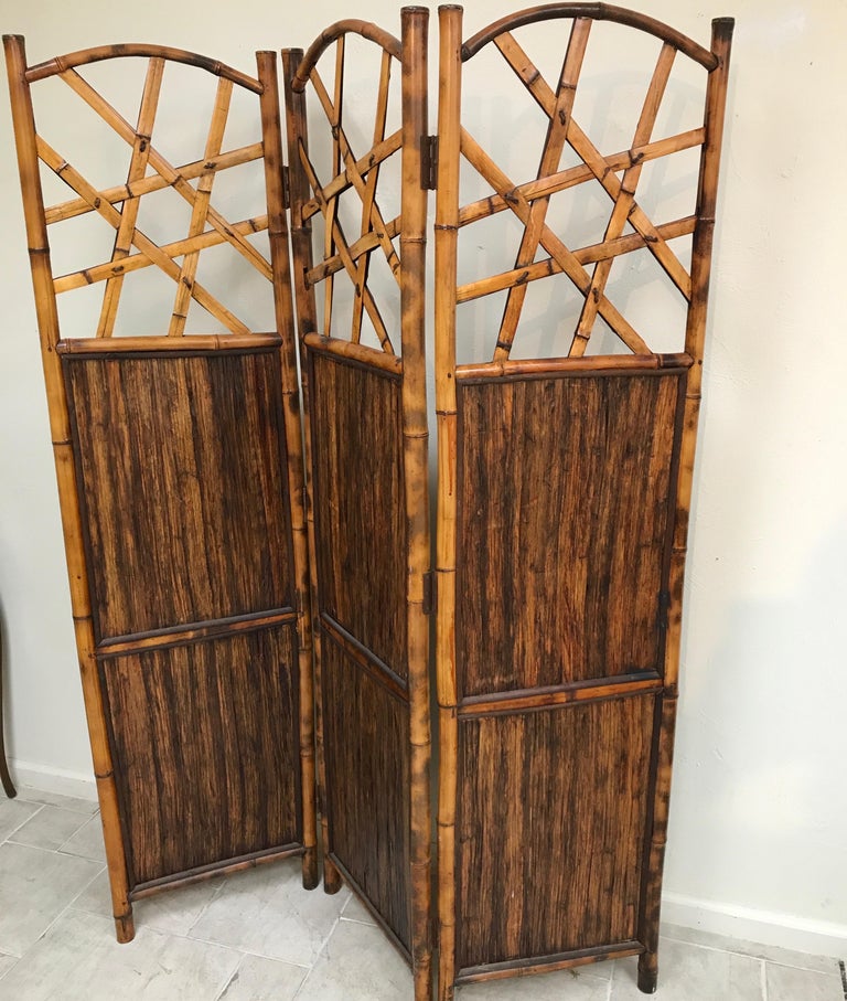 Three panel arched top burnt bamboo screen. Each panel is 18