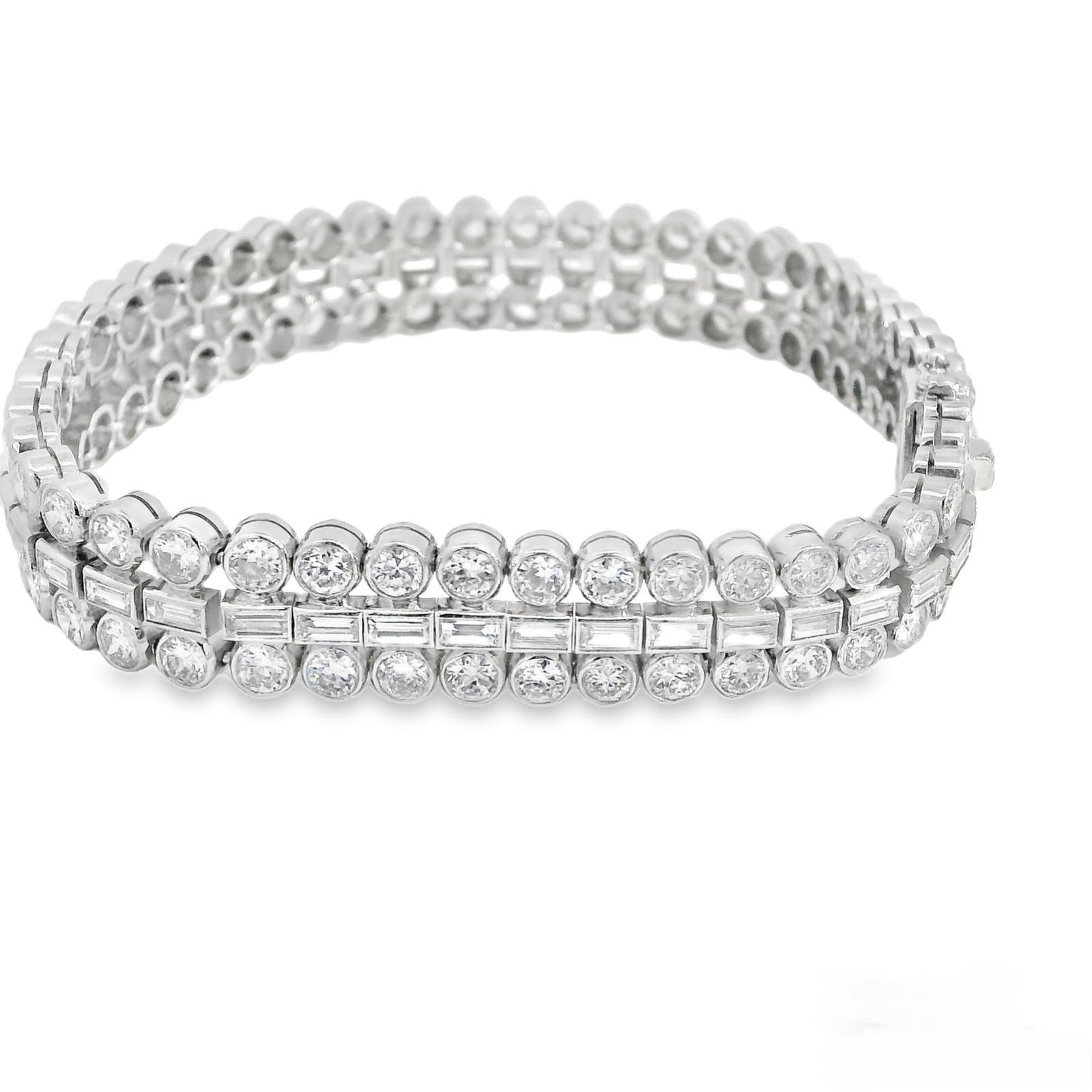 A great find from a recent estate! Three Row Tennis Bracelet with Straight Baguettes and Old European brilliant Round Cuts. 96 Old European Round Diamonds weighing approximately 13.50 carats total. The Rounds are of FG colors and VS/ Si1 clarity.