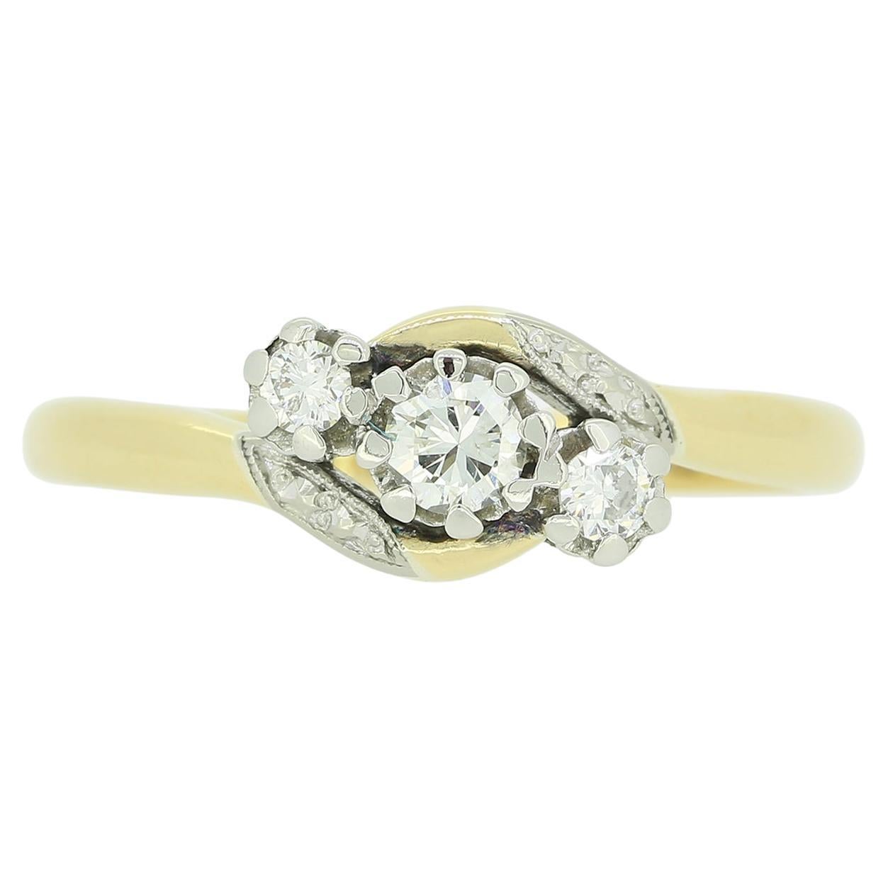 Vintage Three-Stone 0.25 Carat Diamond Twist Ring For Sale