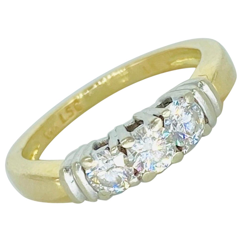 Anello vintage con tre pietre e diamanti da 0,60 carati in oro 14k in vendita