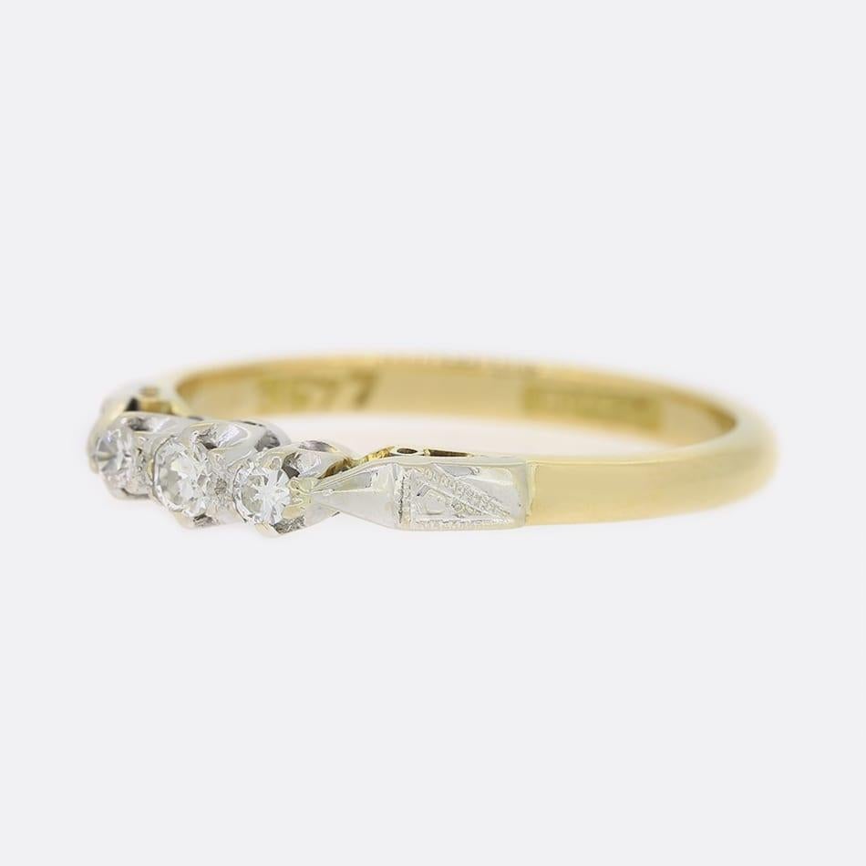 This is a vintage 18ct yellow gold and platinum three stone diamond ring featuring three brilliant round cut diamonds. The central round diamond is set in a six pronged mount as are the two single round diamonds on each side.
Condition: Used (Very