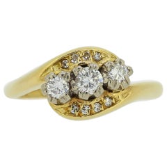 Anello vintage con tre pietre e diamanti