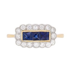 Vintage Three-Stone Sapphire and Diamond Cluster Ring, circa 1950s