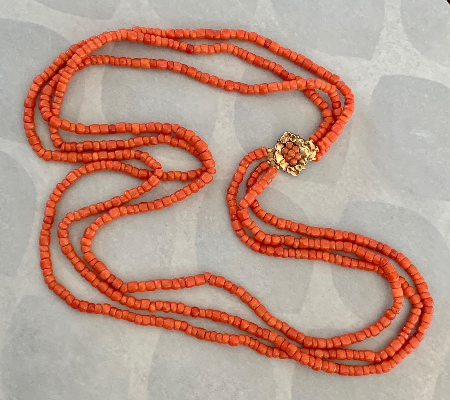 Women's Vintage Three-Strand Graduated Natural Coral Necklace with 14 Karat Gold Clasp For Sale