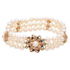 Dreistrangiges Vintage-Perlenarmband mit Saphirverschluss aus 14k Gelbgold