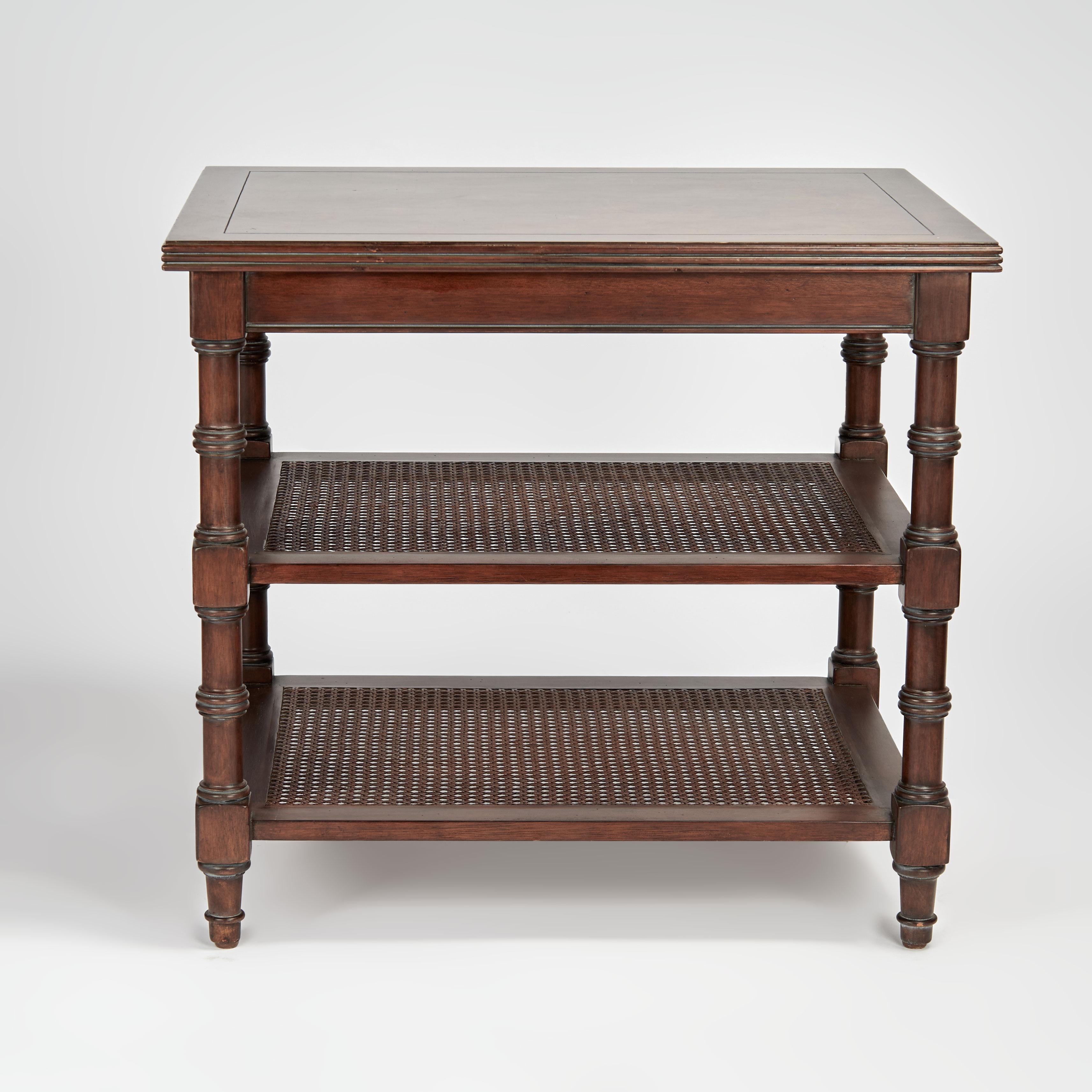 Standout vintage British Colonial style stand crafted in mahogany having a mosaic burled mahogany stopover two lower caned tiers with turned supports and feet. 