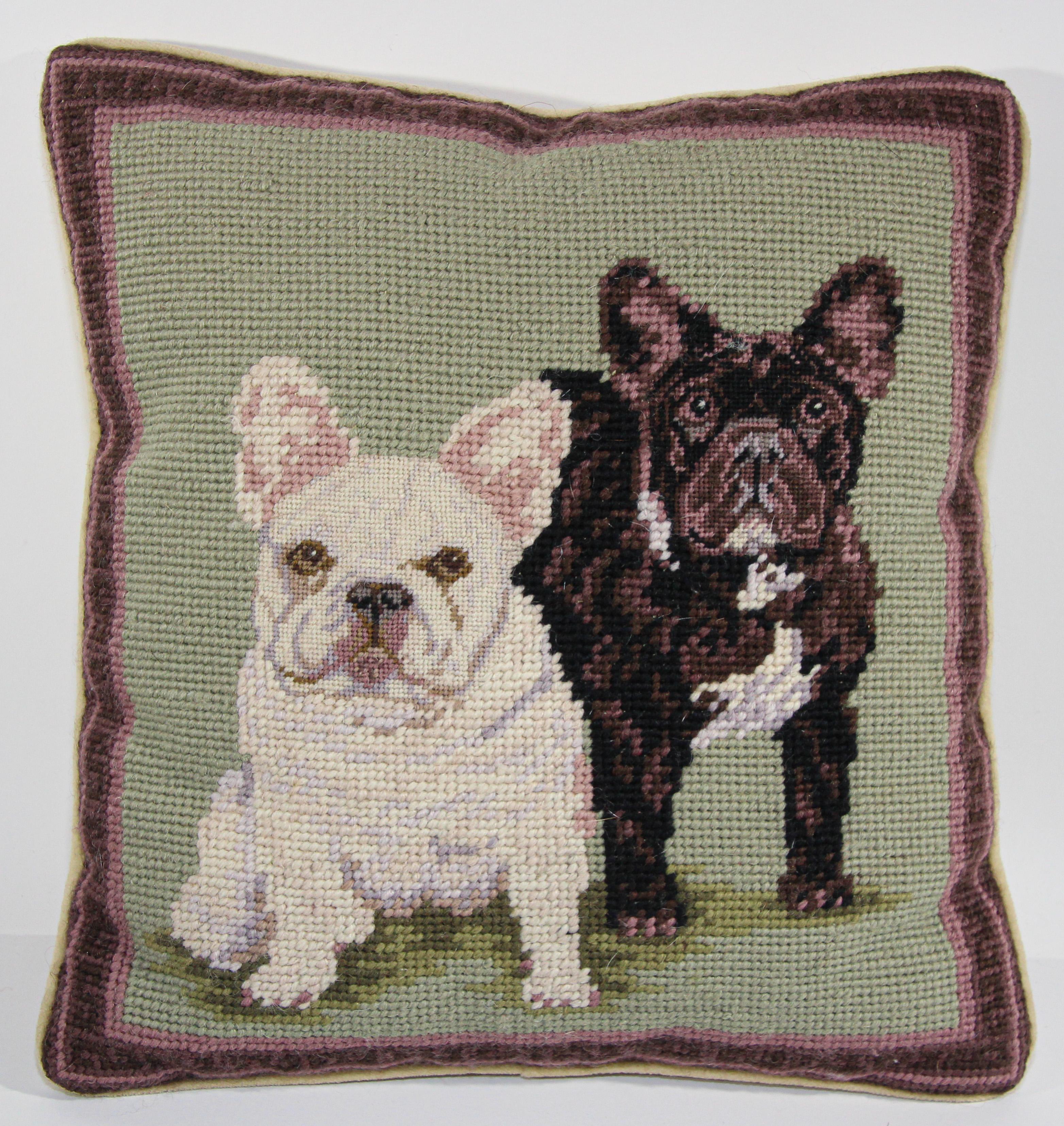 Crewel throw pillow with dogs design featuring portrait of two Boston Terrier bulldogs against a green background. Bordered in browns. 
Hand-crafted in 100% wool needlepoint. 
Great gift for the dog lovers home! 
Dog décor pillow has tan piping