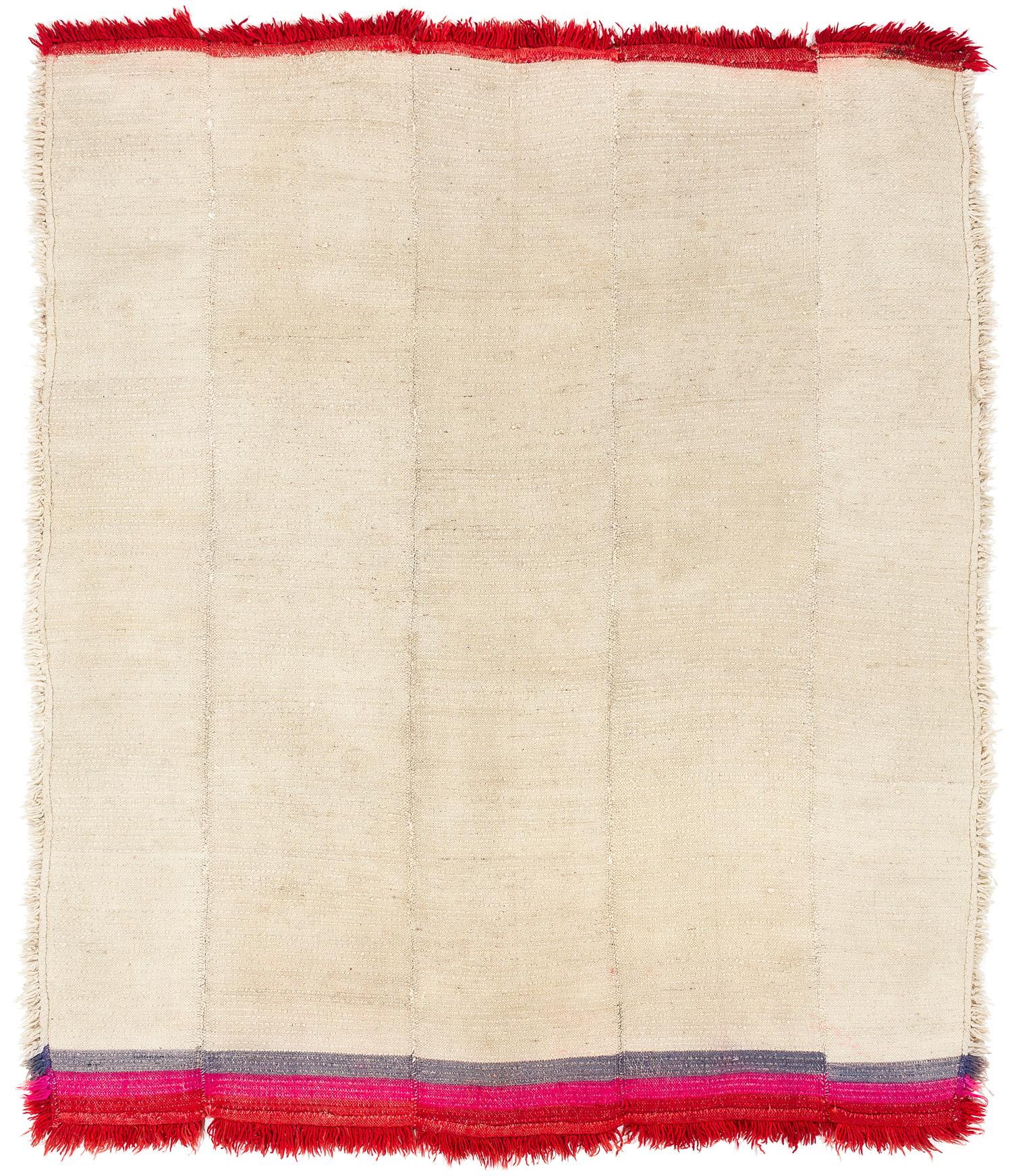 This hand loomed thick pile wool rug would have been used for sleeping on or under during the cold nights in the Himalayas. These rugs would also be used draped around the shoulders as a blanket. Measures: 5'3'' x 6'3''.

Its woven on a small loom