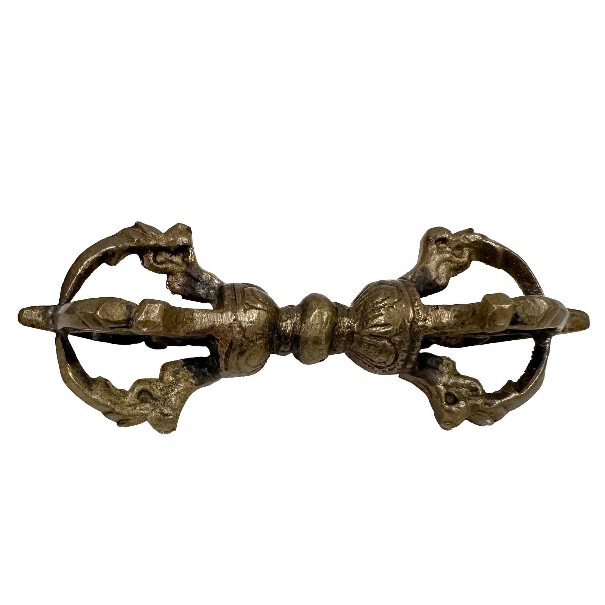 This is handcrafted Tibetan Brass Dharma Instrument. It is all hand made and used in practice Tibetan religious law. Look at the pictures, fine craftsmanship and sturdy construction made it a beautiful home decor or gift.

Size: 1in H x 3.63in W x