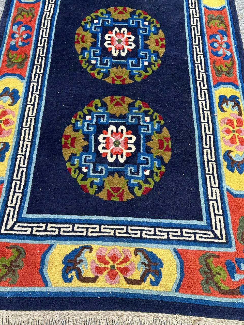 Nice vintage rug from Tibet, with a beautiful antique Chinese design, and nice colours with a navy blue background, blue, red, green, brown and yellow, entirely hand knotted with wool velvet on cotton foundation.


✨✨✨
