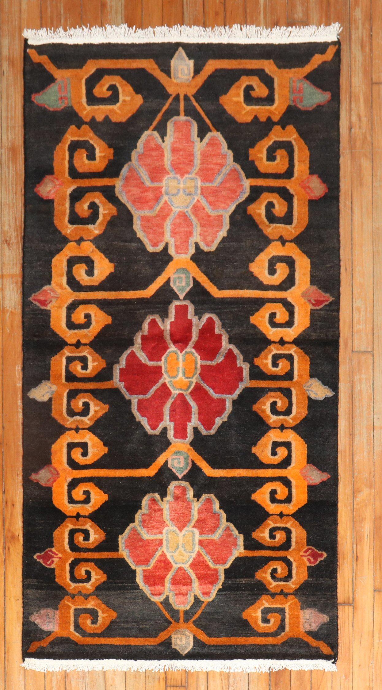 Colorful late 20th century Tibetan rug with a lovely floral design

Measures: 2'11'' x 5'9