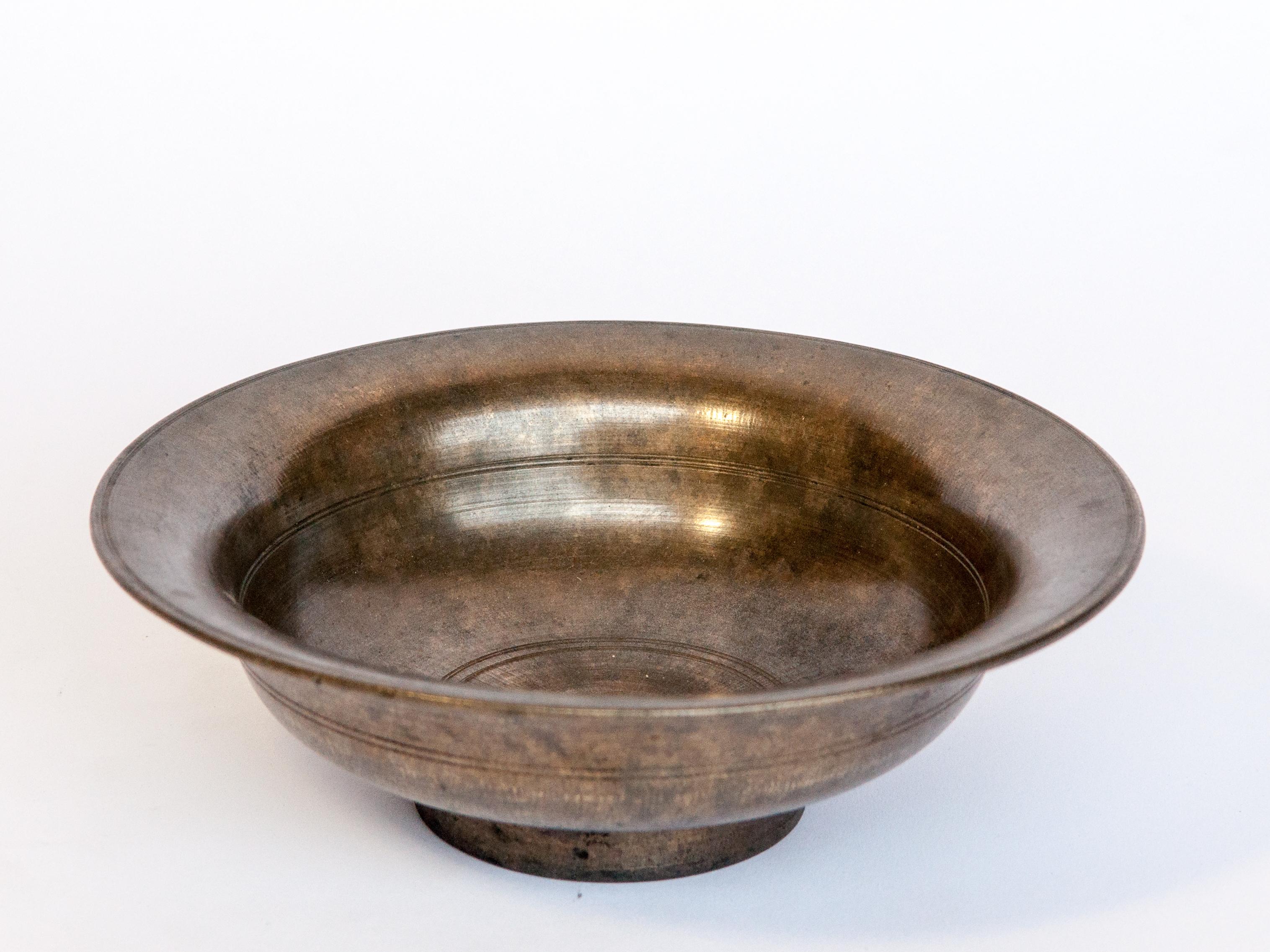 Vintage Tibetan / Nepali Tsampa bowl, bronze. From Nepal, early to mid-20th century.
This bowl come from the highlands of Nepal, along the Tibetan Nepal border where is would have been used as a food bowl for tsampa, a roasted barley flour. This