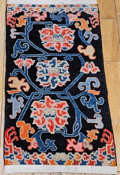 Vintage Tibetan Rug with Lotus Flowers and Auspicious Symbols