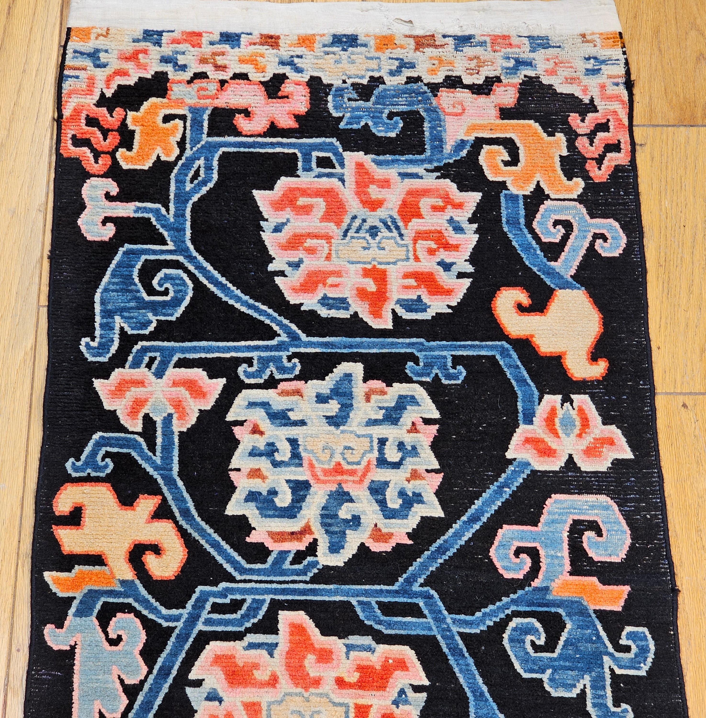 Hand-Knotted Vintage Tibetan Rug with Lotus Flowers and Cloud Symbols in French Blue and Red For Sale