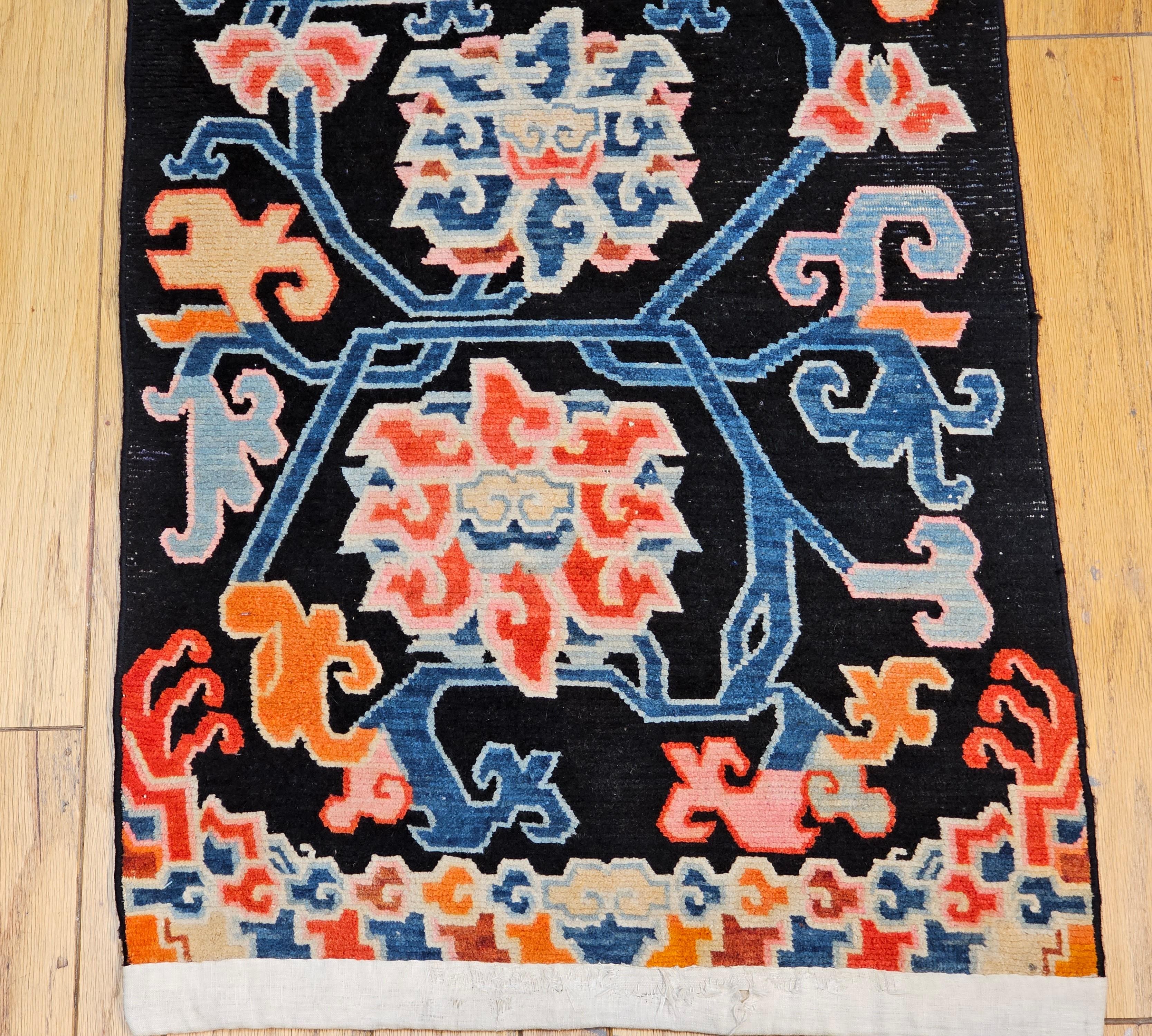 Late 19th Century Vintage Tibetan Rug with Lotus Flowers and Cloud Symbols in French Blue and Red For Sale