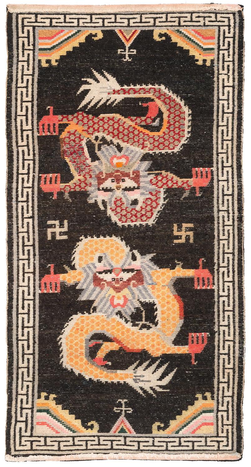 This rug was probably woven in the mid-20th century and woven with really excellent silky wool. Its in perfect condition. This carpet's powerful graphic design with its Stark bold field makes it unusual. Measures: 2'10