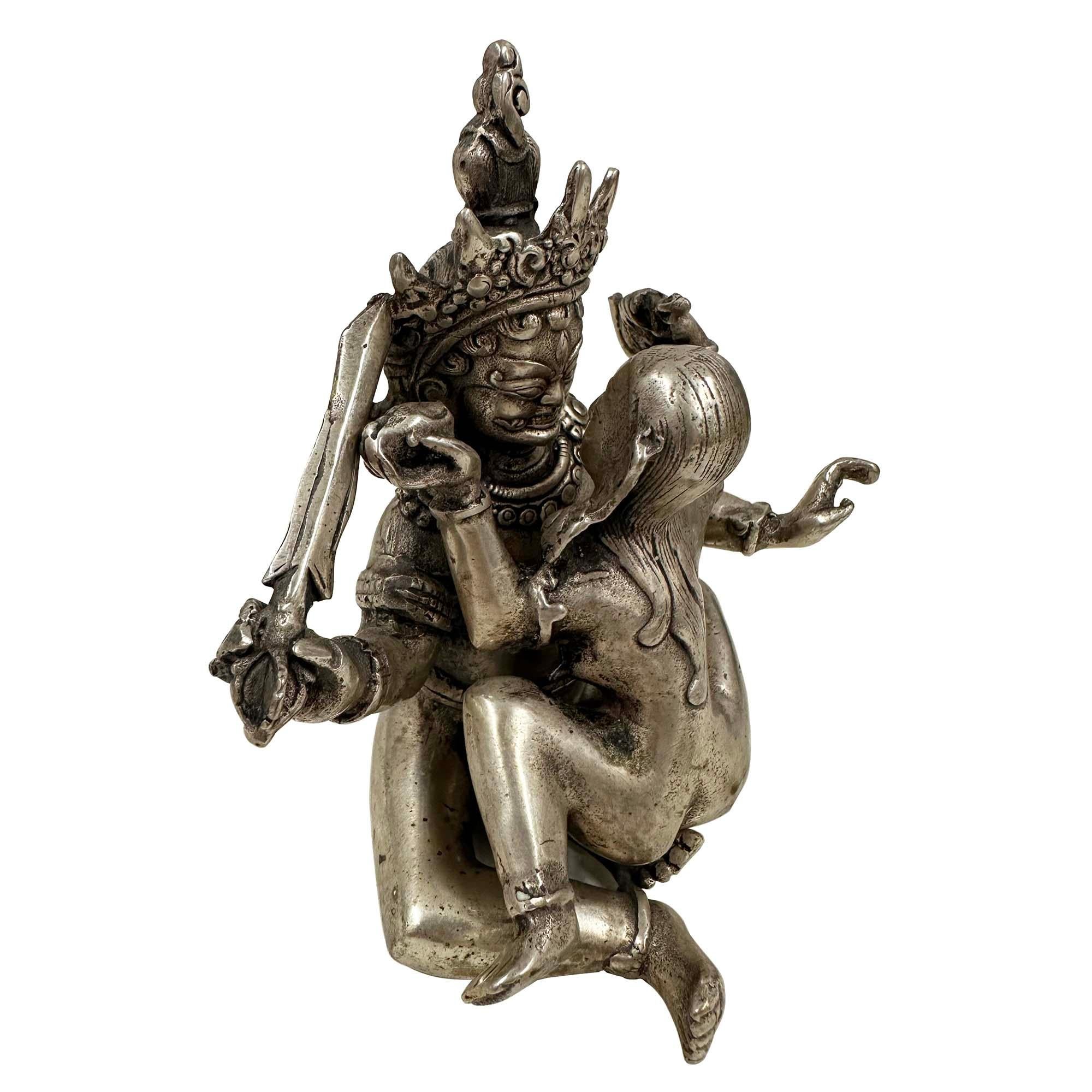 This statue depicts a Yab-Yum, a common symbol in the Tantric Buddhist art of Tibet. The term 