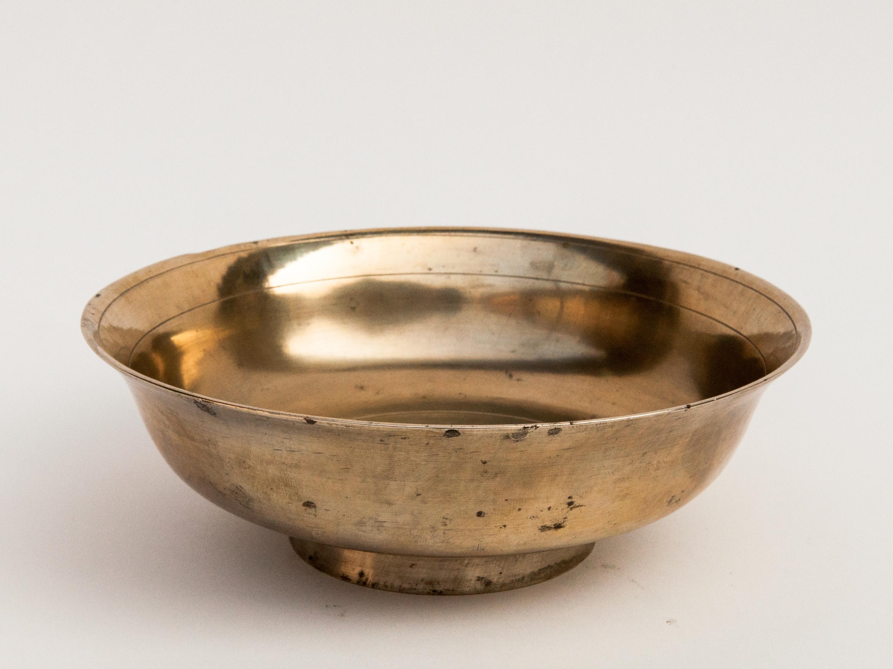 Vintage Tibetan Tsampa bowl, bronze, large. From Nepal or Tibet, mid-20th century
offered by Bruce Hughes.
Tsampa is a Tibetan staple found throughout Tibet as well as among the Tibetan speaking peoples of the high Himalayan valleys of the India /
