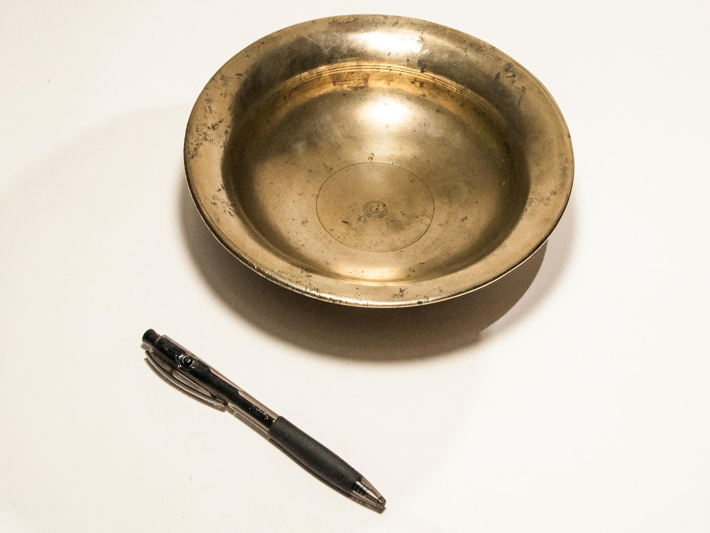Tibetan Tsampa bowl. Bronze, Tibet, early to mid-20th century.
Offered by Bruce Hughes.
Tsampa is a Tibetan staple found throughout Tibet as well as among the Tibetan speaking peoples of the high Himalayan valleys of the India / Nepal / Tibet