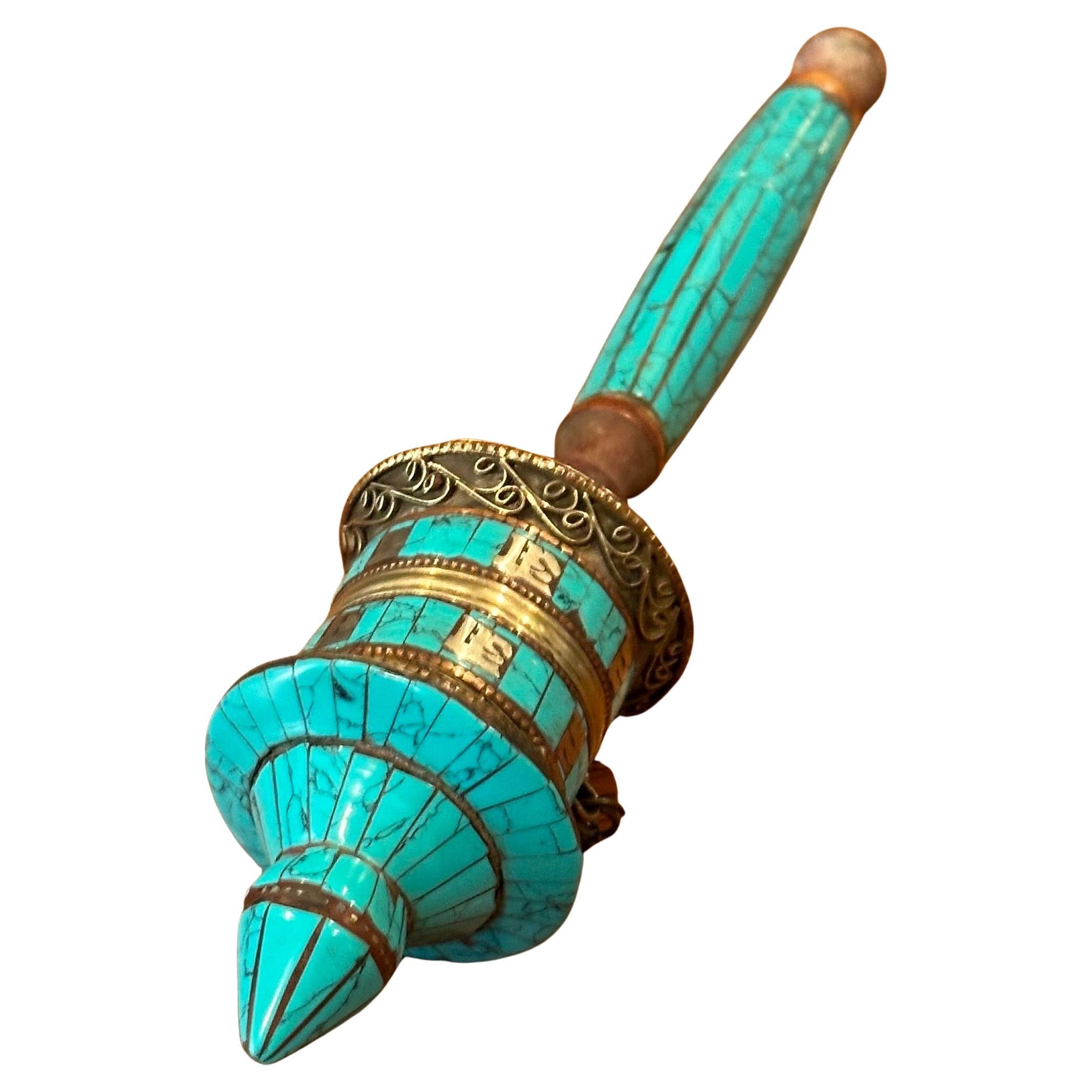 A very nice vintage Tibetan turquoise, wood and brass prayer wheel, circa 1970s. The piece is in very good vintage condition and measures 1.75