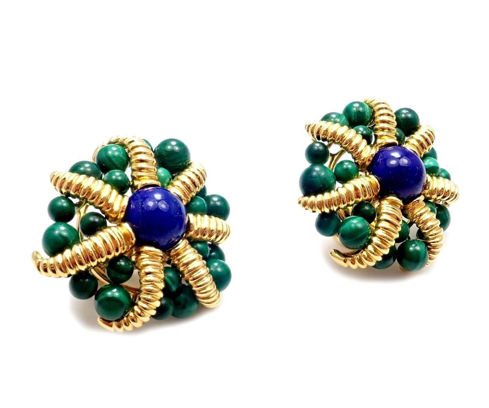 18k Yellow Gold Lapis Lazuli And Malachite Large Earrings by Tiffany & Co. 
With 2x Lapis Lazuli: 10mm each
42x Malachite: 4mm to 6mm
These earrings are made for pierced ears.
Details: 
Weight:  42.5 grams
Dimensions: 32mm
Stamped Hallmarks: 