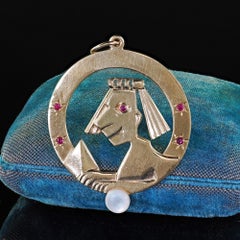 Vintage Tiffany and Co 14K Yellow Gold Egyptian Sphinx Abstract Ruby Pendant