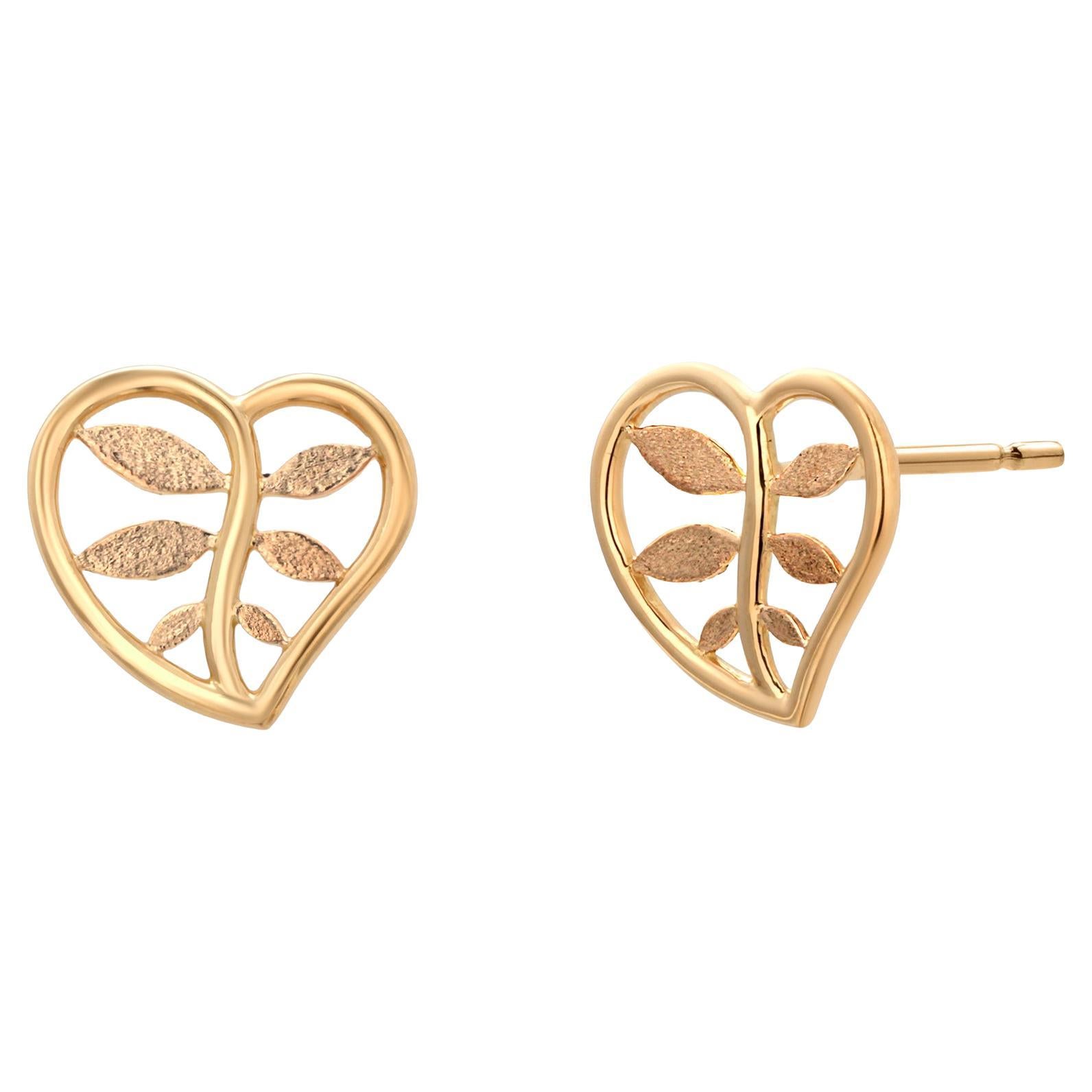 Pendientes vintage Tiffany
Co. de oro amarillo de 18 quilates con forma de corazón y botánicos