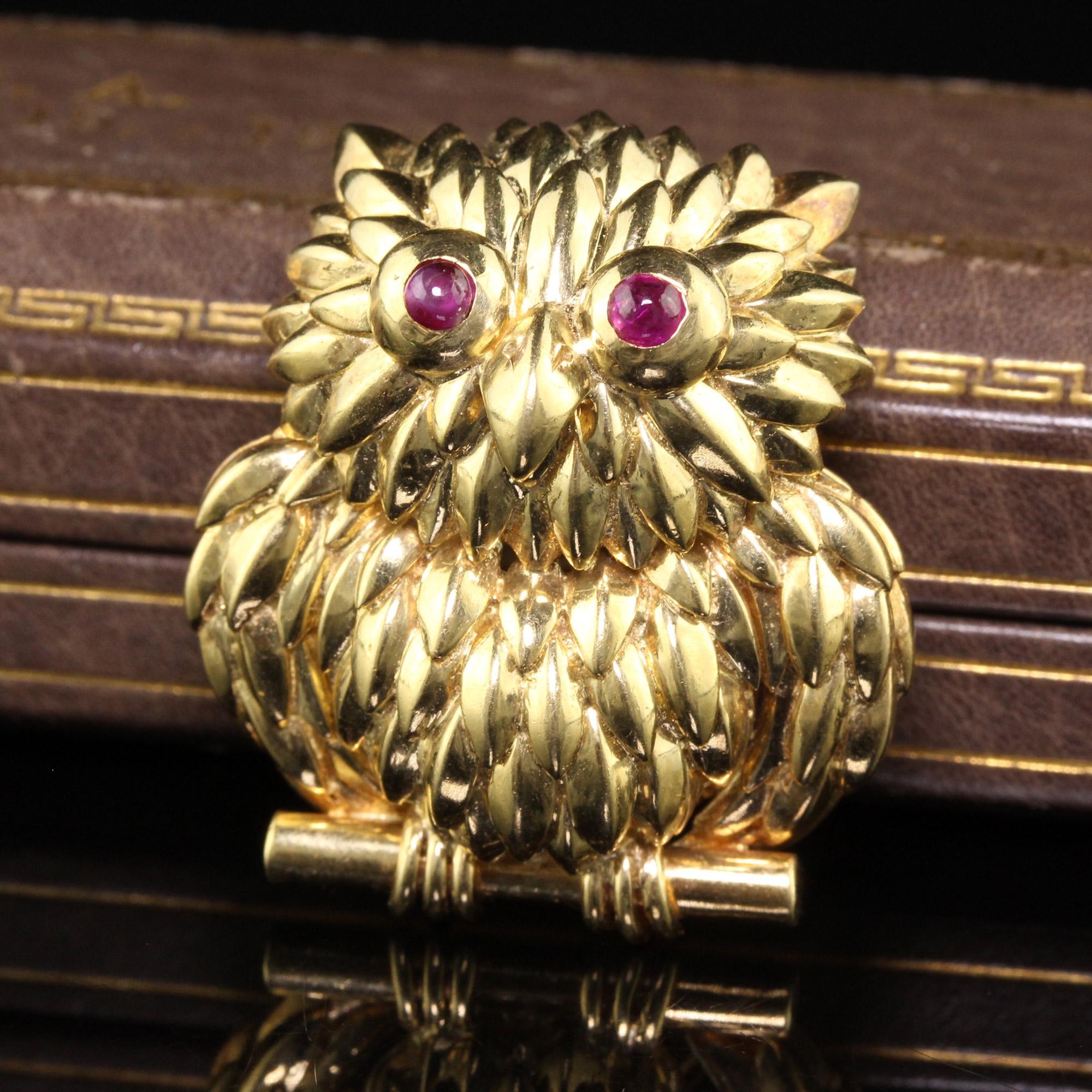 Beautiful Vintage Tiffany and Co 18K Yellow Gold Ruby Owl Brooch Pin. This gorgeous pin is crafted in 18k yellow gold. This gorgeous pin has genuine ruby eyes and has gorgeous craftsmanship as each feather looks to be put on individually during the