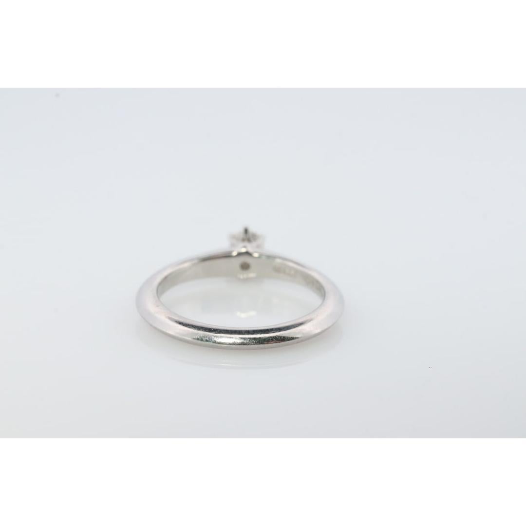 Round Cut Vintage Tiffany and Co. Diamond Ring. Authentic 0.17ct Tiffany Platinum Diamond For Sale