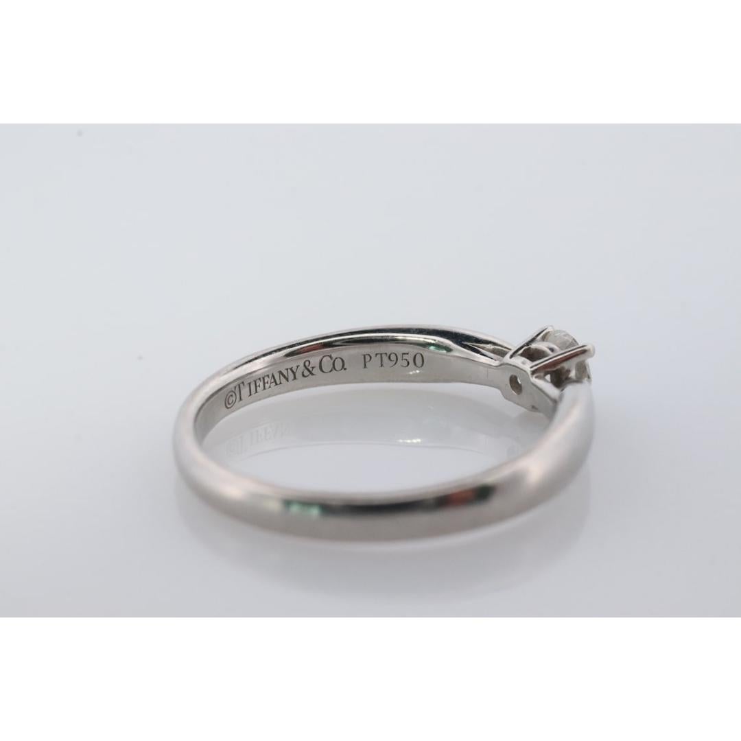 Round Cut Vintage Tiffany and Co. Diamond Ring. Authentic 0.19ct Tiffany HARMONY Platinum For Sale