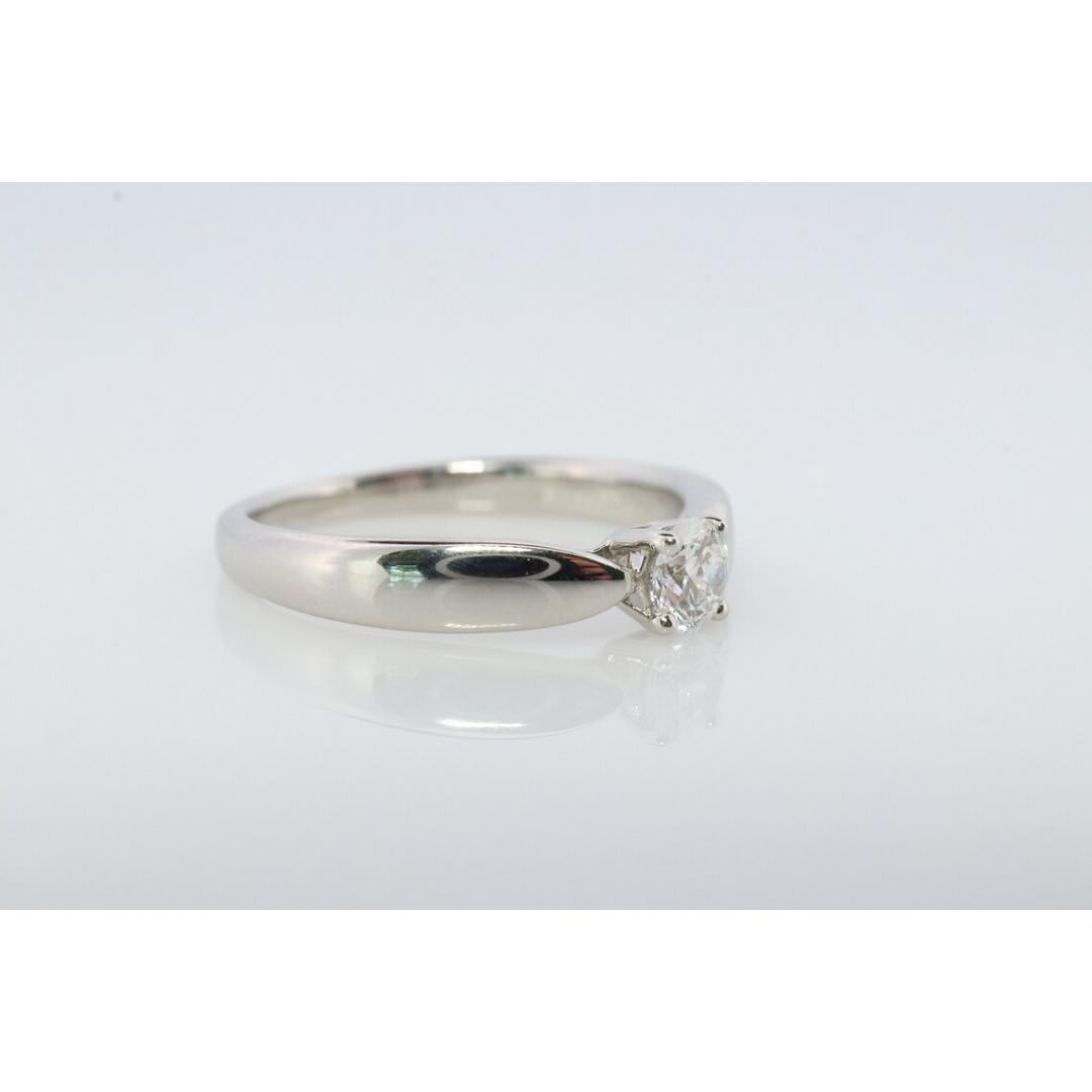 Vintage Tiffany and Co. Diamond Ring. Authentic 0.19ct Tiffany HARMONY Platinum In Good Condition For Sale In Port Charlotte, FL