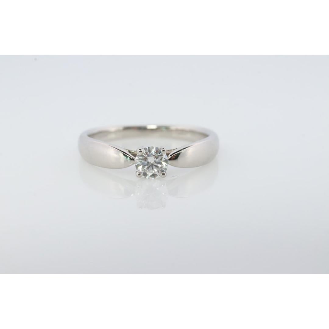 Vintage Tiffany and Co. Diamond Ring. Authentic 0.19ct Tiffany HARMONY Platinum For Sale 1