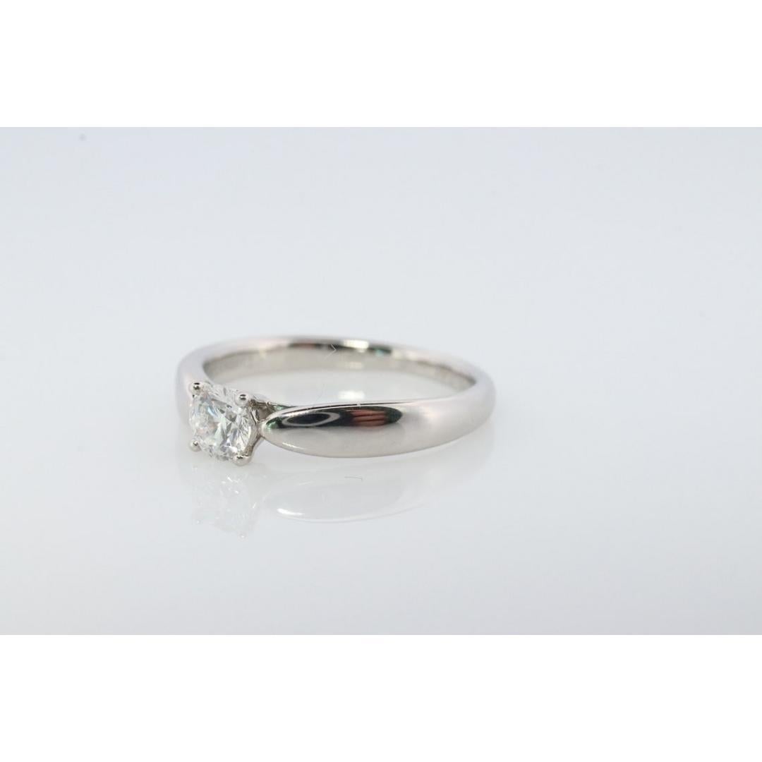Round Cut Vintage Tiffany and Co. Diamond Ring. Authentic 0.22ct Tiffany HARMONY Platinum For Sale