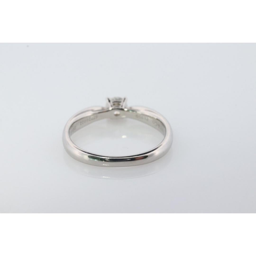 Vintage Tiffany and Co. Diamond Ring. Authentic 0.22ct Tiffany HARMONY Platinum In Good Condition For Sale In Port Charlotte, FL