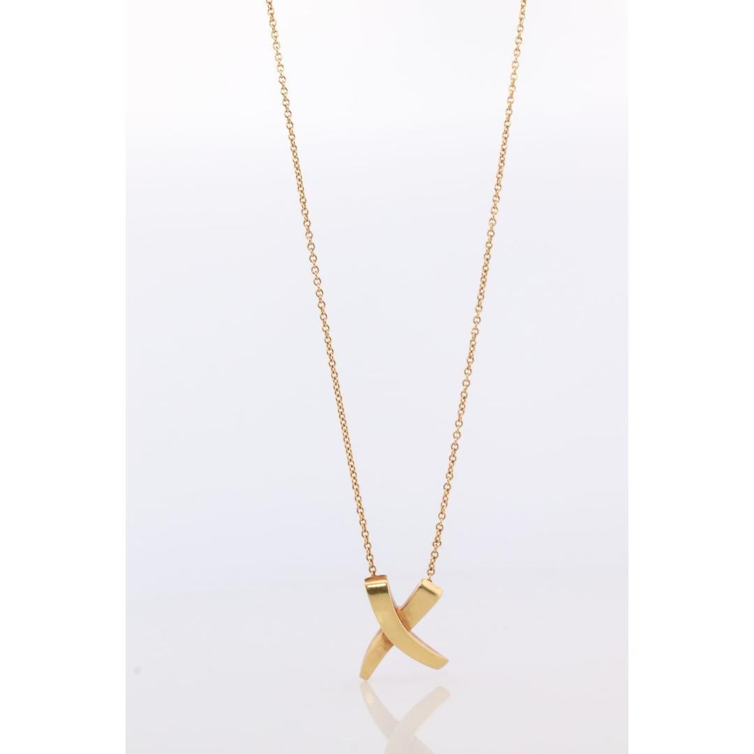 Vintage degli anni '90

Materiali: Oro, Platino

Collana Tiffany & Co. in oro giallo 18 ct.

X Crossover Paloma Picasso Design

Condit: Viene fornito con la copertina originale Tiffany.

Dettagli:
Lunghezza 17 pollici

Chiedi ulteriori immagini e