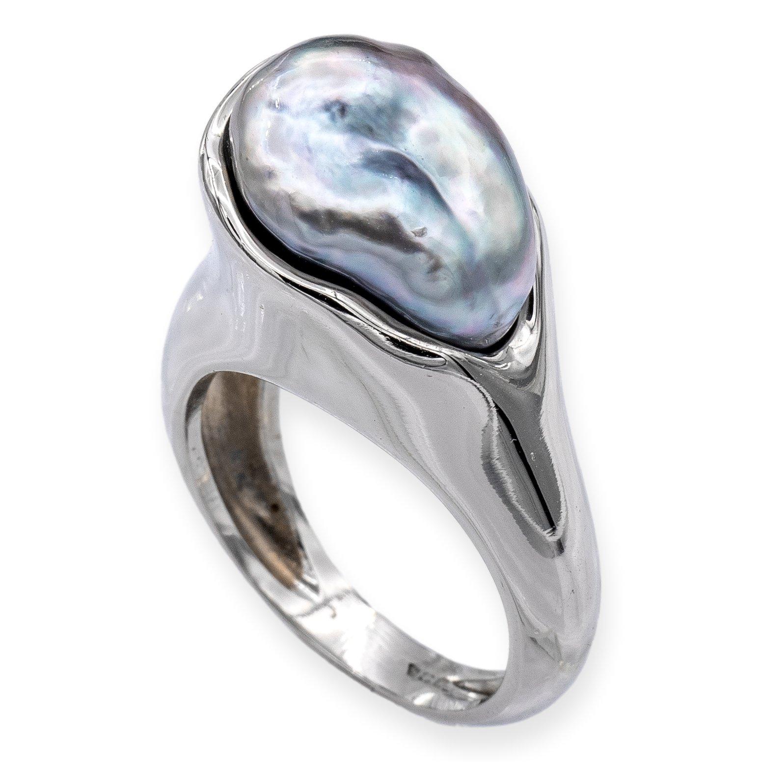 Vintage Tiffany & Co ring designed by Elsa Peretti finely crafted in platinum featuring a Tahitian Baroque pearl center with gray body in color and good luster sitting low on a swirl platinum edge measuring North to South 14.0 mm and sitting 11.0 mm