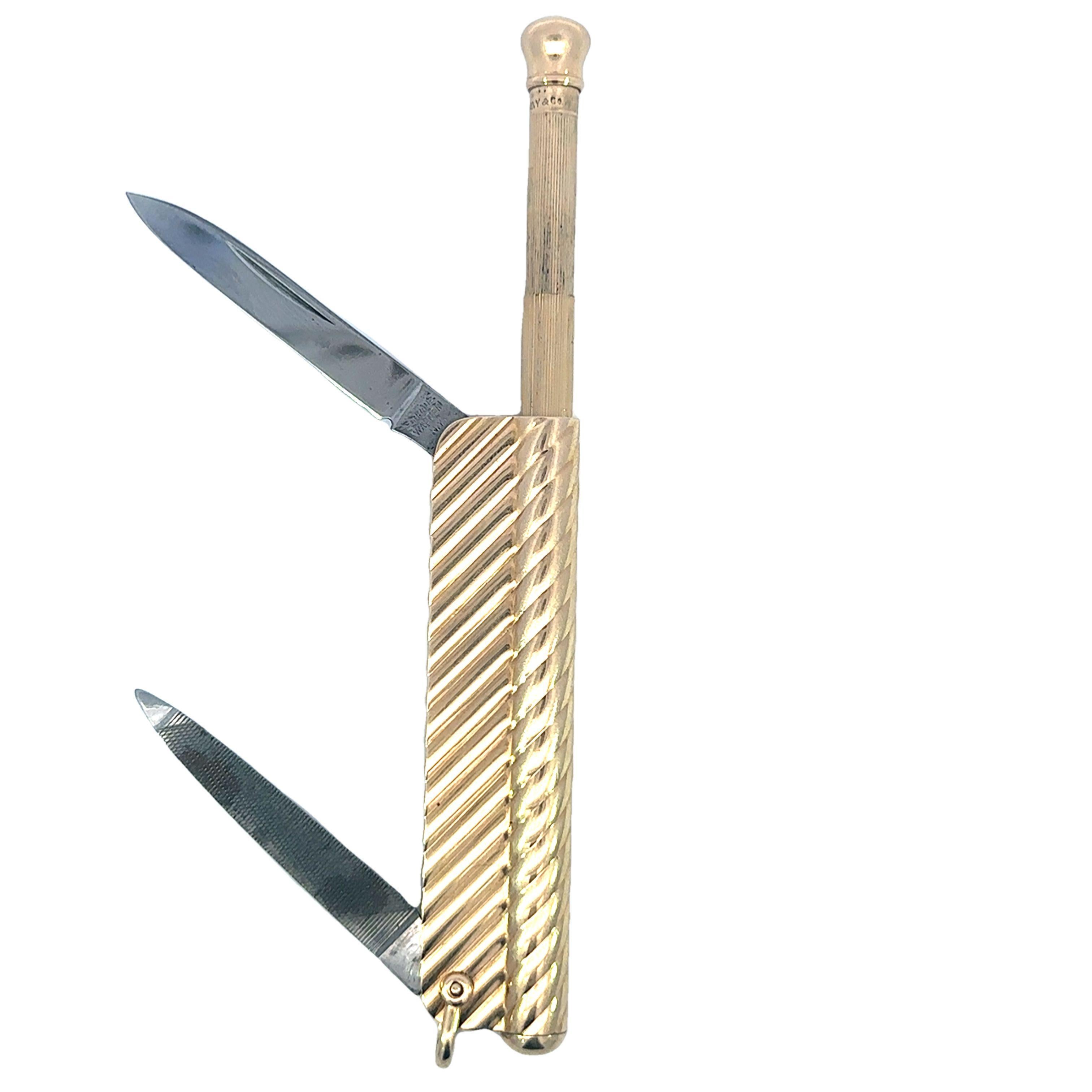 Navaja de bolsillo vintage Tiffany & Co. y lápiz de trabajo extensible en oro de 14 quilates

Esta navaja de bolsillo y portaminas extensible vintage de Tiffany & Co. es un ejemplo notable de la capacidad de la marca para fusionar lujo y