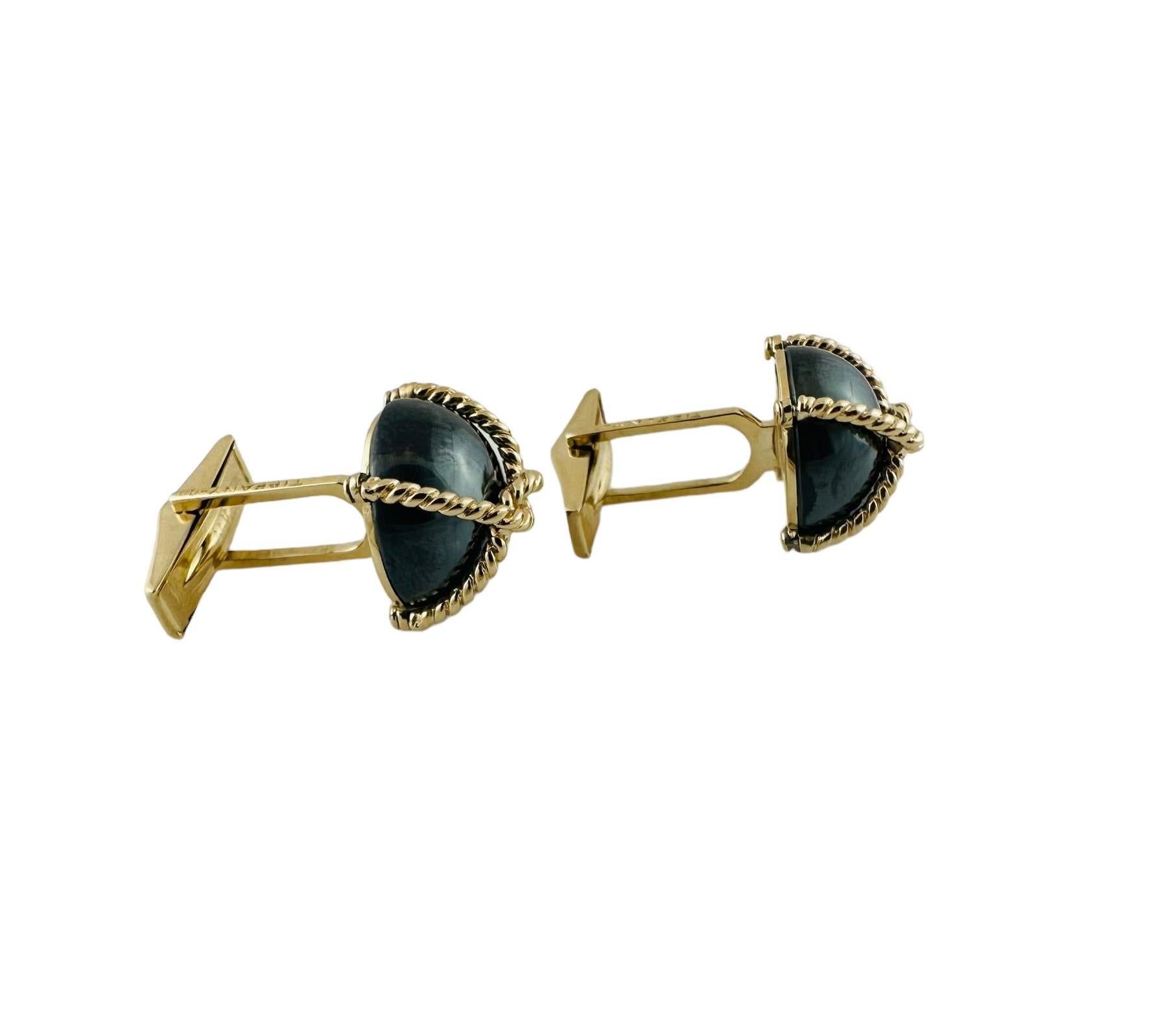 Vintage Tiffany & Co. 14K Yellow Gold Hematite Cufflinks

These Tiffany & Co. cufflinks are set in yellow gold each with a cabochon hematite stone at front.

Cufflinks are approx. 1