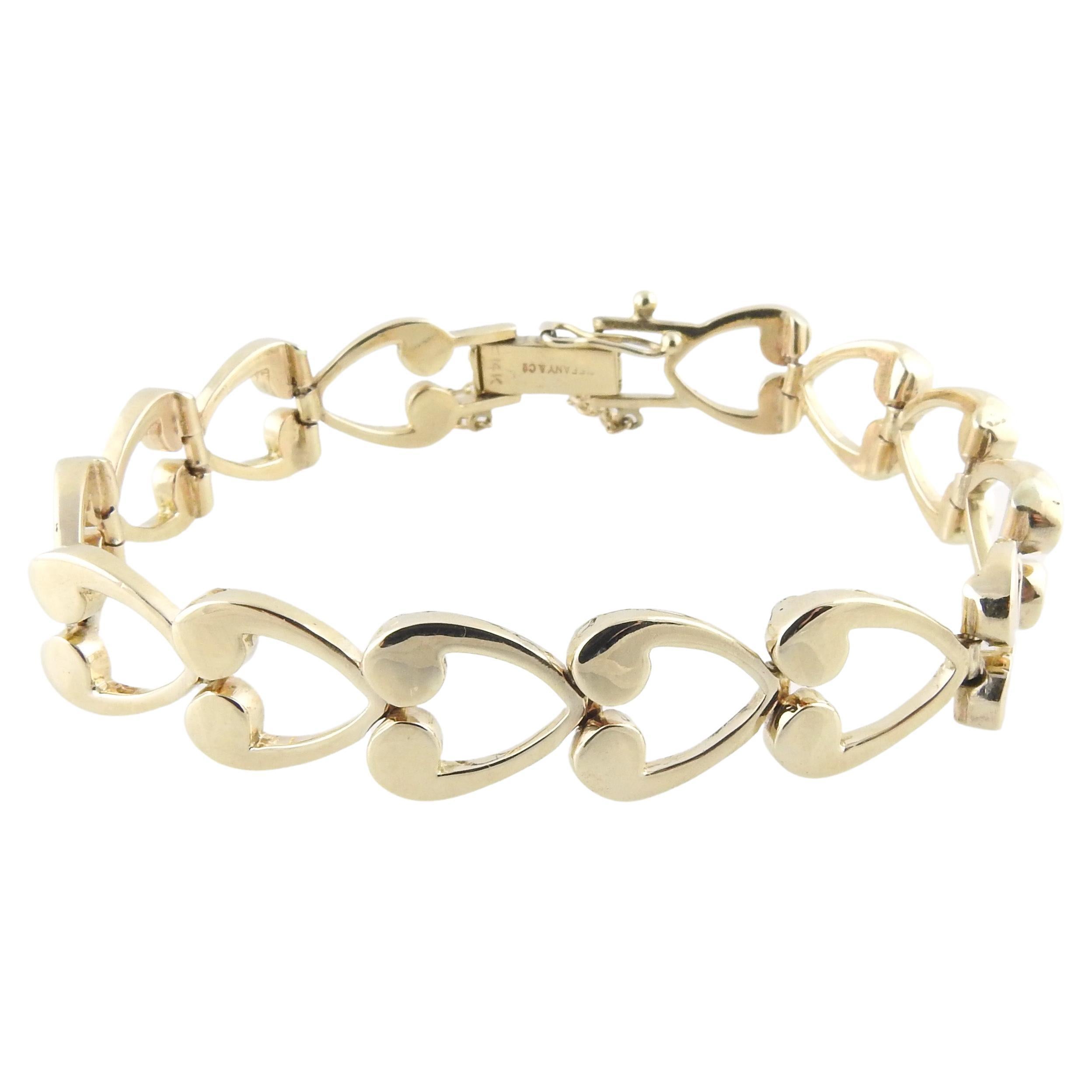 Tiffany & Co. 14K Yellow Gold Open Heart Link Bracelet with Sapphire Cla