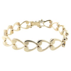 Tiffany & Co. 14K Yellow Gold Open Heart Link Bracelet with Sapphire Cla